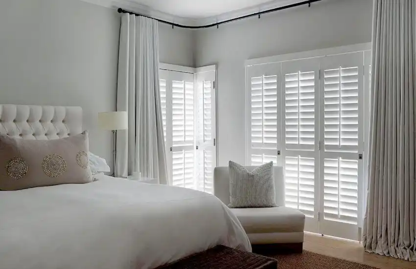 Instructions For Combining Plantation Shutters With Curtains