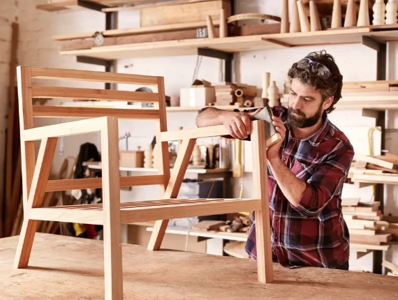 Carpenter Working on Furniture