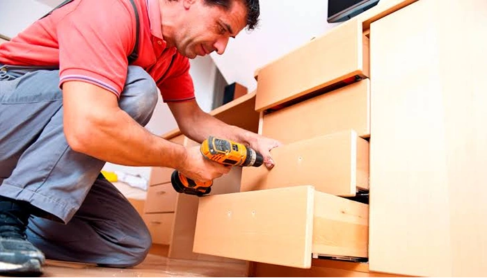 Furniture Fixing completed with tightened fittings aligned panels and restored stability